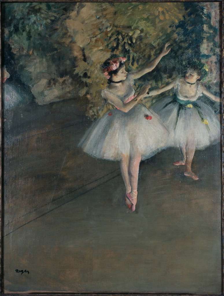 Courtauld 03 Edgar Degas - Two Dancers on a Stage 3. Edgar Degas - Two Dancers on the Stage. 1874, 62 x 46 cm. Degas gives no indication of whether we are watching a performance or a rehearsal of the two dancers, who are in standard ballet positions. At the far left is a third dancer, her figure cut by the frame. The ballet, with its precision of movements, fascinated him, but he always presented it in ways which revealed its artificiality, by including other extraneous elements  figures which do not watch the dancers, waiting dancers scratching themselves, or dancers who play no part in the main action, like the figure on the left here.